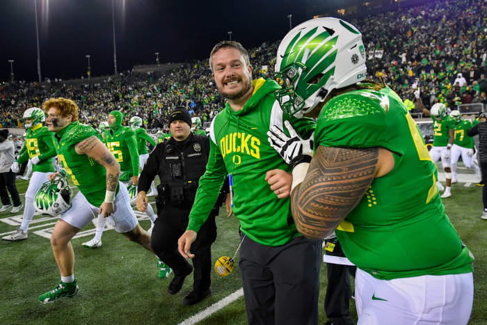 Oregon head coach Dan Lanning celebrates the Ducks' 20-17 win over Utah in an NCAA college football game Saturday, Nov. 19, 2022, in Eugene, Ore.